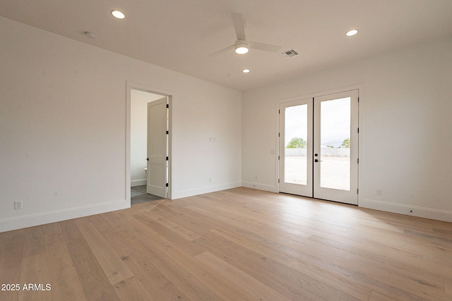 6832 N 178th Ln, Waddell, AZ 85355 - unfurnished room featuring light wood-type flooring, visible vents, a ceiling fan, recessed lighting, and french doors