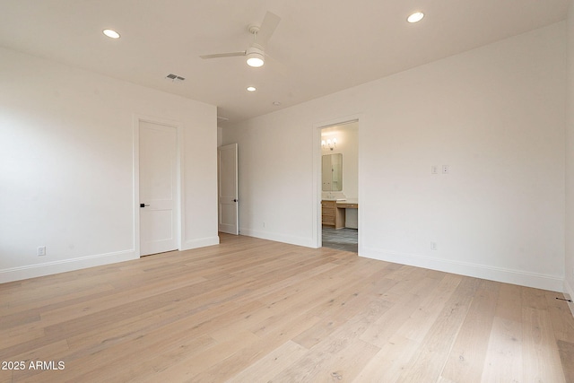 6832 N 178th Ln, Waddell, AZ 85355 - empty room featuring light wood-type flooring, baseboards, visible vents, and ceiling fan