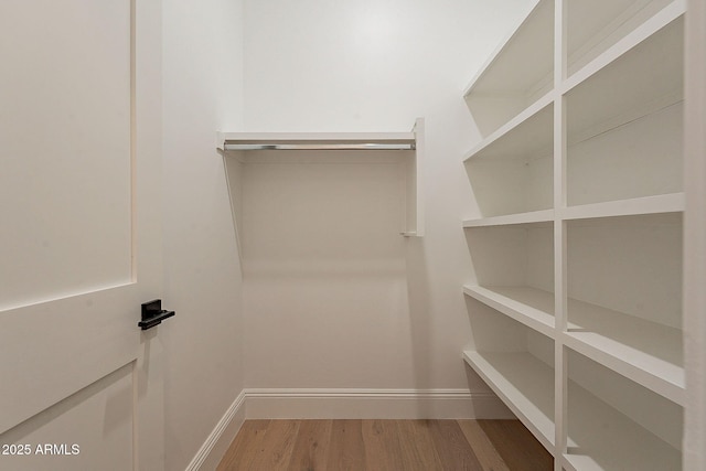 6832 N 178th Ln, Waddell, AZ 85355 - spacious closet with wood finished floors