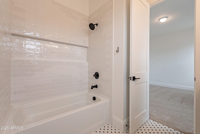 6832 N 178th Ln, Waddell, AZ 85355 - bathroom featuring tub / shower combination and baseboards