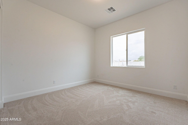 6832 N 178th Ln, Waddell, AZ 85355 - empty room featuring light colored carpet, visible vents, and baseboards