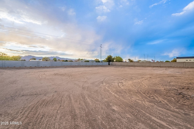 6832 N 178th Ln, Waddell, AZ 85355 - view of yard with a mountain view and fence