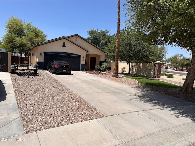 1924 S Rome St, Gilbert, AZ 85295 - view of front facade with an attached garage, driveway, stucco siding, and a gate