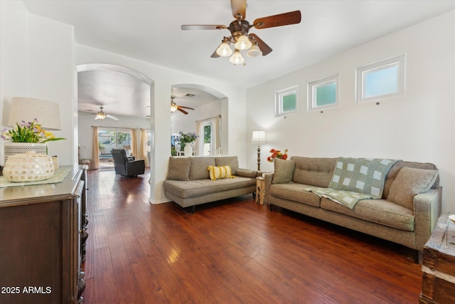 1924 S Rome St, Gilbert, AZ 85295 - living room featuring a ceiling fan, arched walkways, and dark wood finished floors