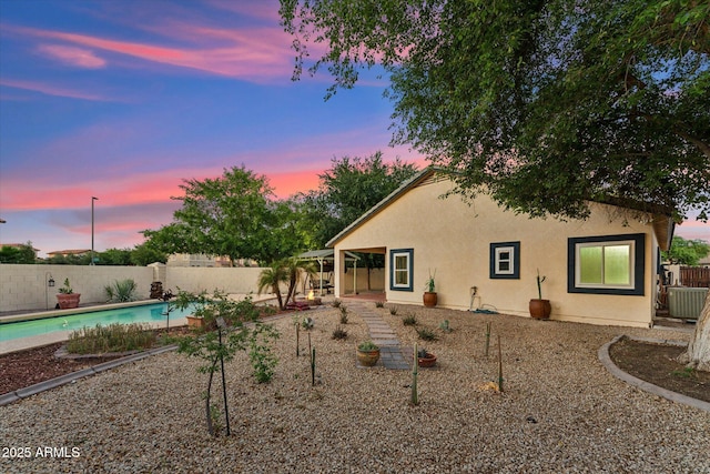 1924 S Rome St, Gilbert, AZ 85295 - rear view of property featuring a fenced backyard, stucco siding, and a patio area