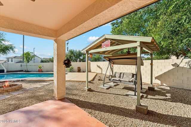 1924 S Rome St, Gilbert, AZ 85295 - fenced backyard featuring a patio, a gazebo, and an outdoor fire pit