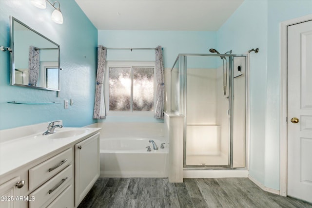 1924 S Rome St, Gilbert, AZ 85295 - bathroom featuring vanity, a shower stall, a bath, and wood finished floors