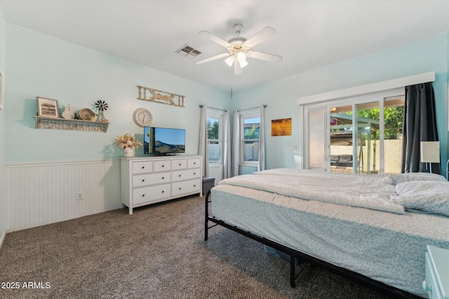 1924 S Rome St, Gilbert, AZ 85295 - bedroom with carpet, wainscoting, ceiling fan, and access to outside