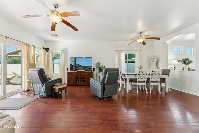 1924 S Rome St, Gilbert, AZ 85295 - living room featuring a ceiling fan, arched walkways, and hardwood / wood-style floors