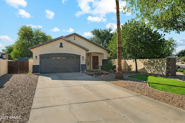 1924 S Rome St, Gilbert, AZ 85295 - view of front facade featuring stucco siding, concrete driveway, an attached garage, and a gate