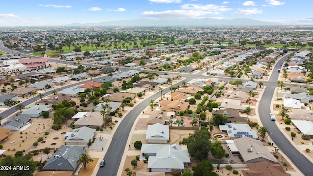 birds eye view of property featuring a mountain view