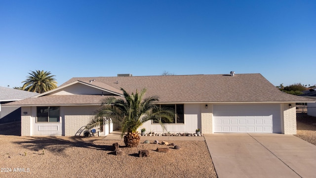 ranch-style home with a garage