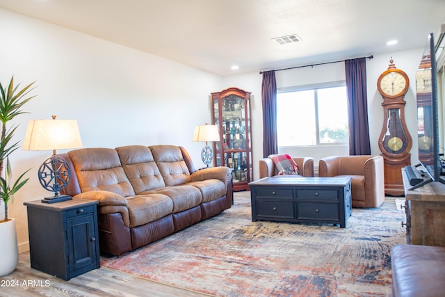 living room with light hardwood / wood-style floors