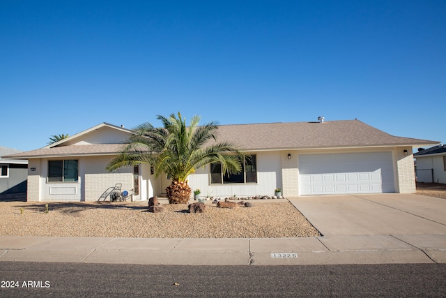 ranch-style home with a garage