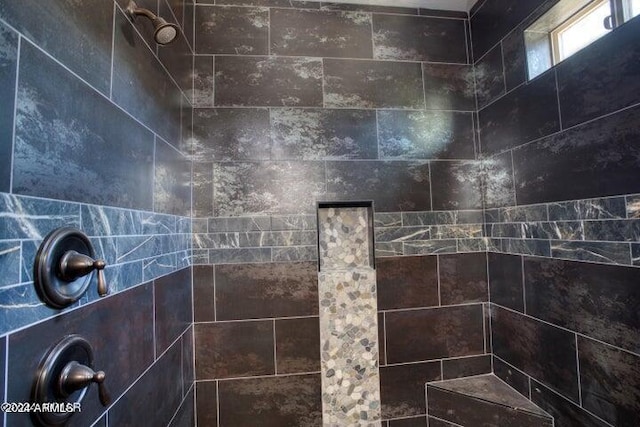 room details with a tile shower