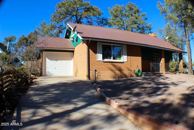 view of front of home featuring a garage and a porch