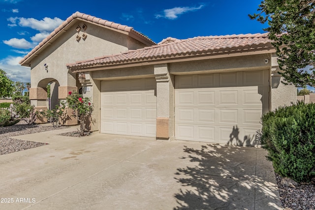 2535 N Pinnule Cir, Mesa, AZ 85215 - view of front facade featuring stucco siding, driveway, and a tiled roof