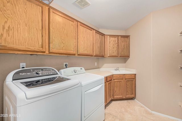 2535 N Pinnule Cir, Mesa, AZ 85215 - clothes washing area featuring separate washer and dryer, cabinet space, baseboards, and light tile patterned floors