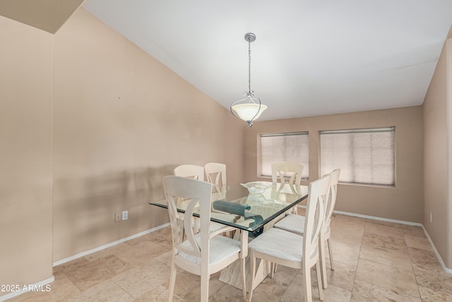 2535 N Pinnule Cir, Mesa, AZ 85215 - dining room featuring baseboards, vaulted ceiling, and light stone finish flooring