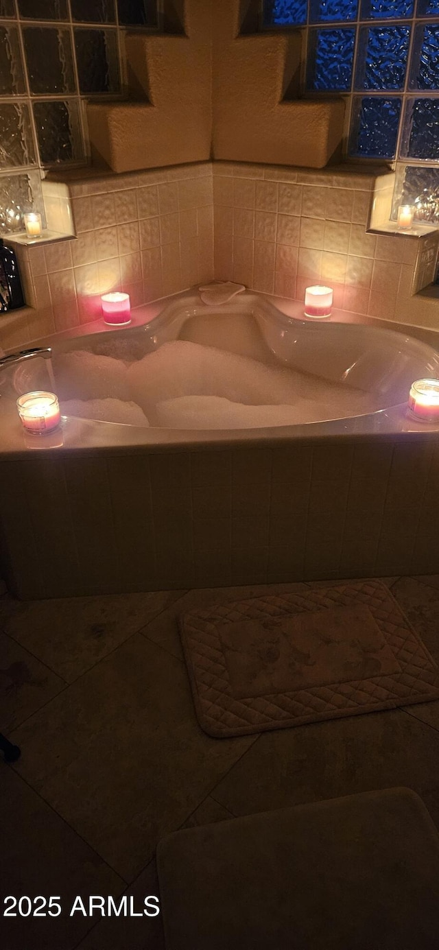 2535 N Pinnule Cir, Mesa, AZ 85215 - bathroom with tile patterned floors, a garden tub, and backsplash