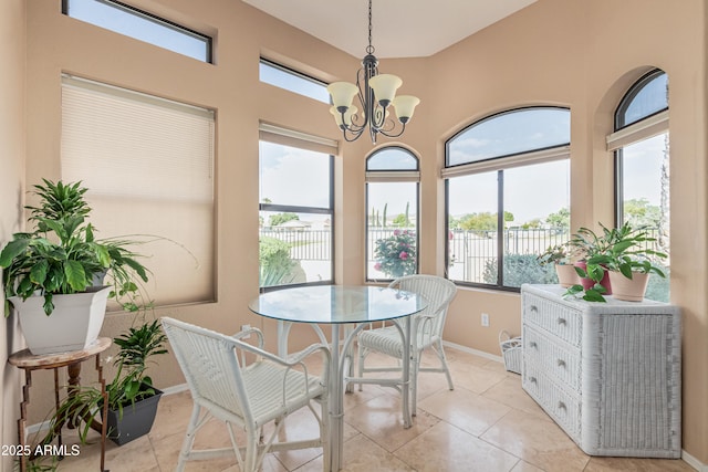 2535 N Pinnule Cir, Mesa, AZ 85215 - dining room featuring baseboards, a chandelier, and light tile patterned floors