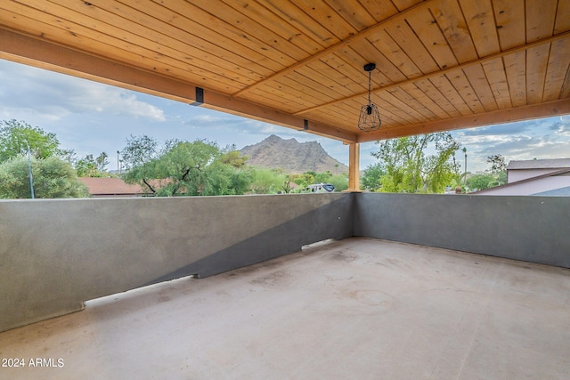 view of patio / terrace with a mountain view