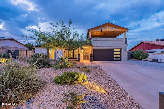 view of front of property featuring a garage