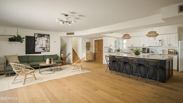 living room with light wood-type flooring