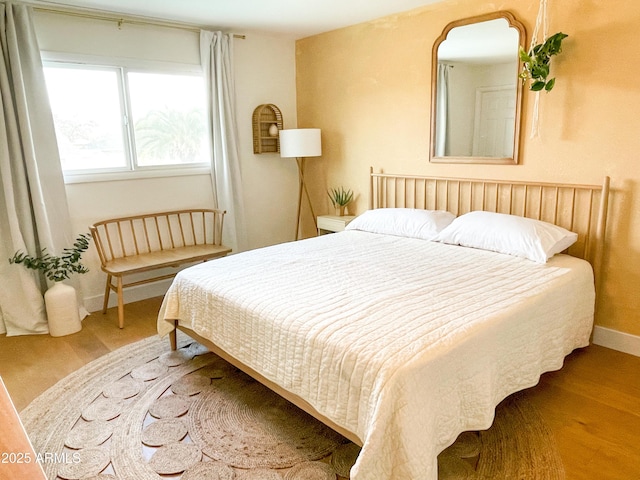 bedroom featuring hardwood / wood-style flooring