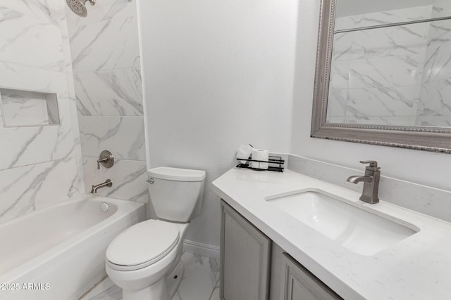 bathroom with marble finish floor,  shower combination, toilet, and vanity