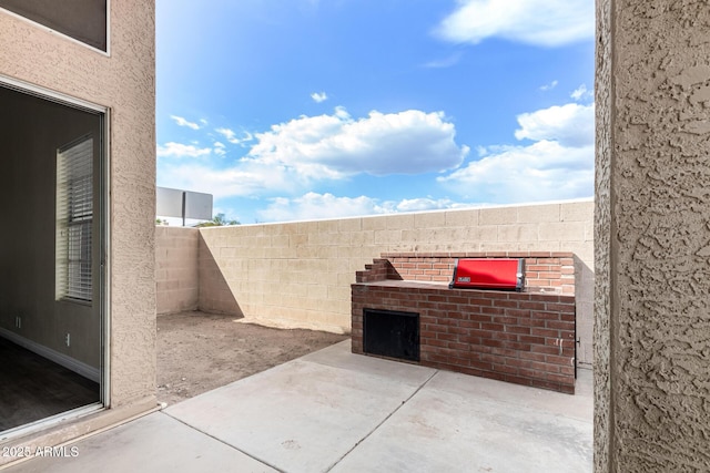 view of patio with a fenced backyard