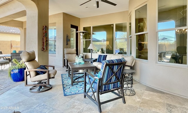 view of patio with ceiling fan