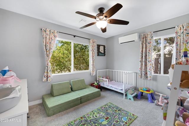 1615 E Roma Ave, Phoenix, AZ 85016 - bedroom featuring a wall mounted AC, carpet floors, multiple windows, and a ceiling fan