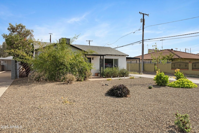 1615 E Roma Ave, Phoenix, AZ 85016 - view of front of property with fence and stucco siding