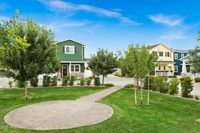 view of front facade featuring a front yard and a porch