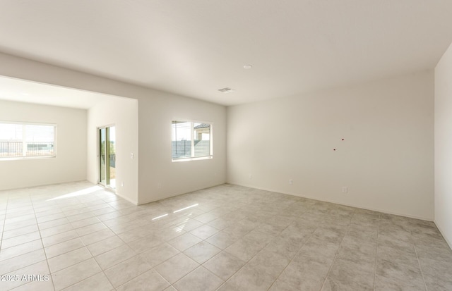 5029 S 252nd Ave, Buckeye, AZ 85326 - spare room featuring light tile patterned floors