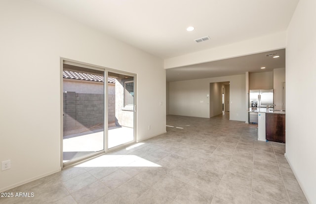 5029 S 252nd Ave, Buckeye, AZ 85326 - spare room featuring recessed lighting and baseboards