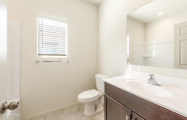 5029 S 252nd Ave, Buckeye, AZ 85326 - bathroom featuring vanity, toilet, baseboards, and tile patterned flooring