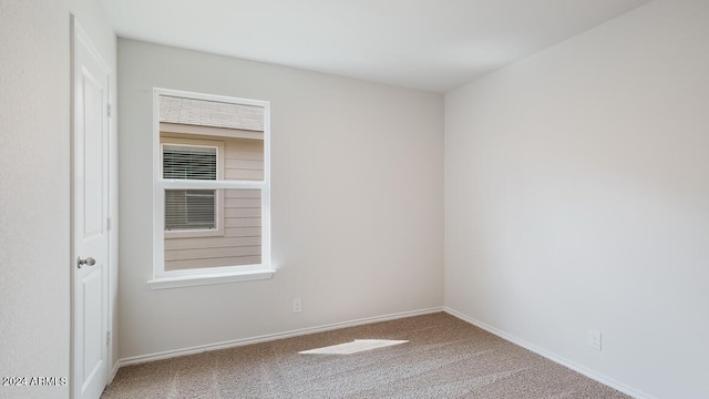 9507 S Mara Dr, Apache Junction, AZ 85120 - carpeted empty room with baseboards