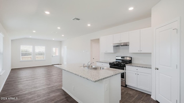 9507 S Mara Dr, Apache Junction, AZ 85120 - kitchen featuring stainless steel gas stove, under cabinet range hood, an island with sink, white cabinets, and dark wood-style floors