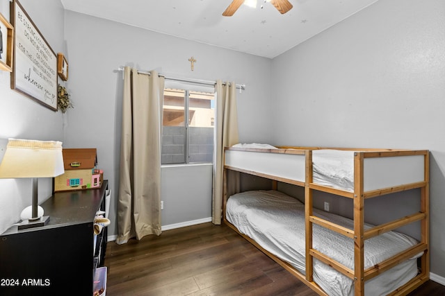 bedroom featuring dark hardwood / wood-style flooring and ceiling fan