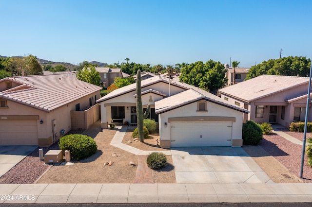 view of front of property with a garage