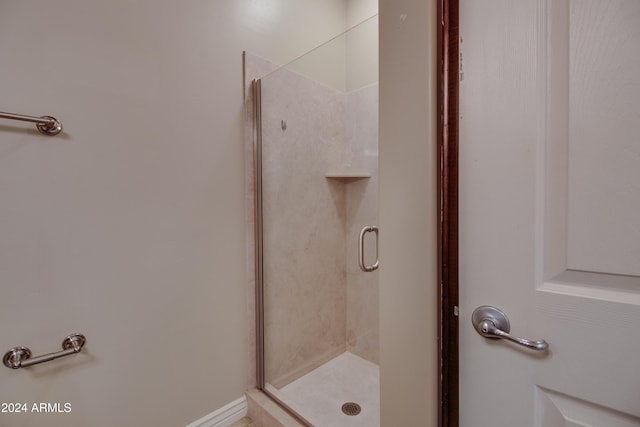 bathroom featuring walk in shower