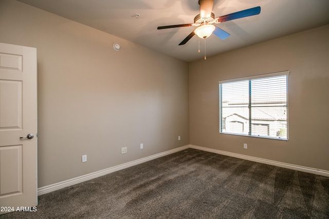 carpeted empty room with ceiling fan