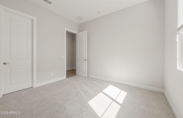 22660 E Pegasus Pkwy, Queen Creek, AZ 85142 - unfurnished bedroom with carpet floors and baseboards
