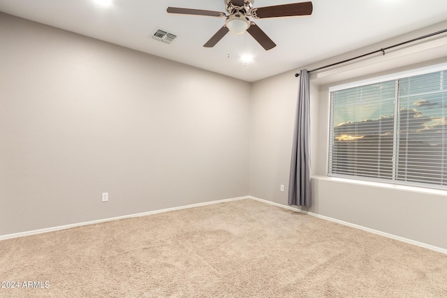 20293 N 83rd Dr, Peoria, AZ 85382 - spare room with carpet floors, baseboards, a ceiling fan, and visible vents