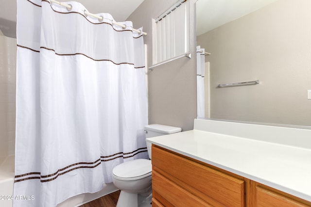 bathroom featuring vanity, toilet, and wood-type flooring