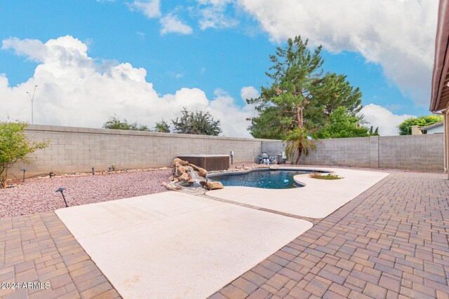 20293 N 83rd Dr, Peoria, AZ 85382 - view of swimming pool featuring a fenced in pool, a fenced backyard, cooling unit, and a patio area
