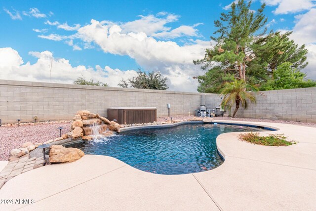 20293 N 83rd Dr, Peoria, AZ 85382 - view of pool featuring a fenced in pool, a fenced backyard, a patio area, and central air condition unit