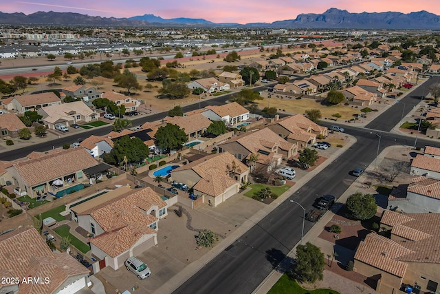 aerial view at dusk with a mountain view